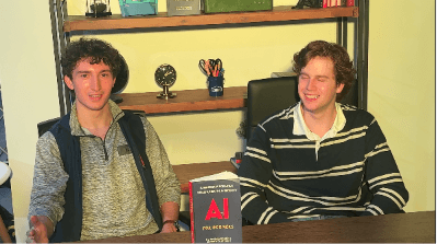 Noah Kruthaupt and Andy Robbins holding AI for Boomers
